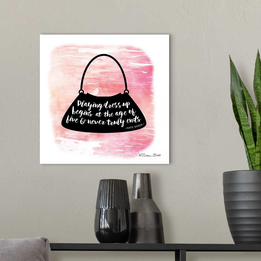 A modern room featuring Silhouette of a purse with a motivational quote hand-lettered in white script, over a pink waterc...