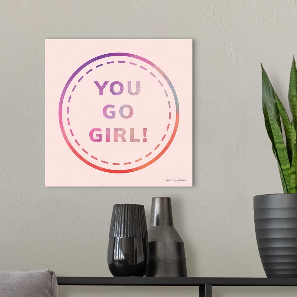 A modern room featuring You Go Girl