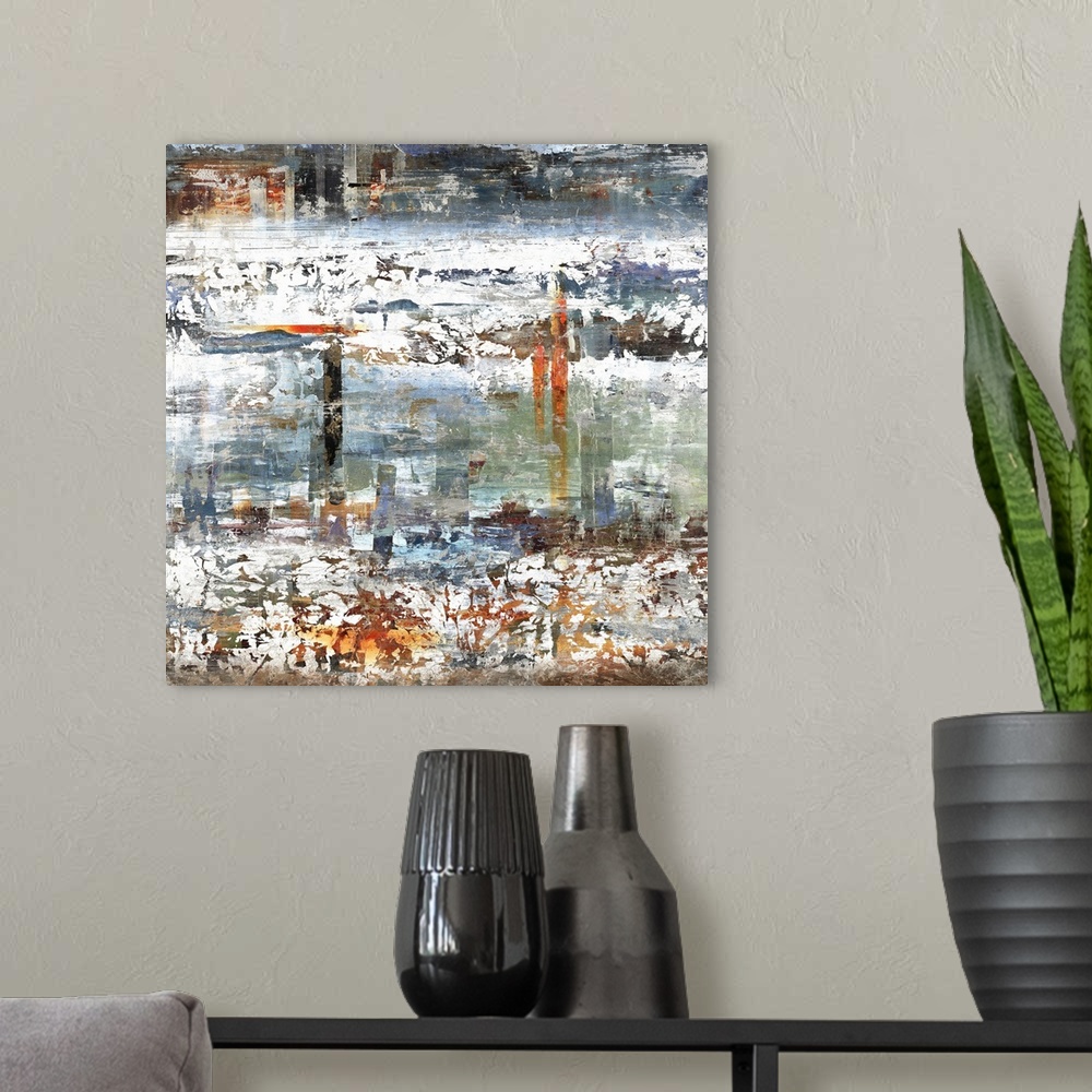 A modern room featuring Square abstract art with a balance of both cool and warm tones and thick, white, choppy bands run...