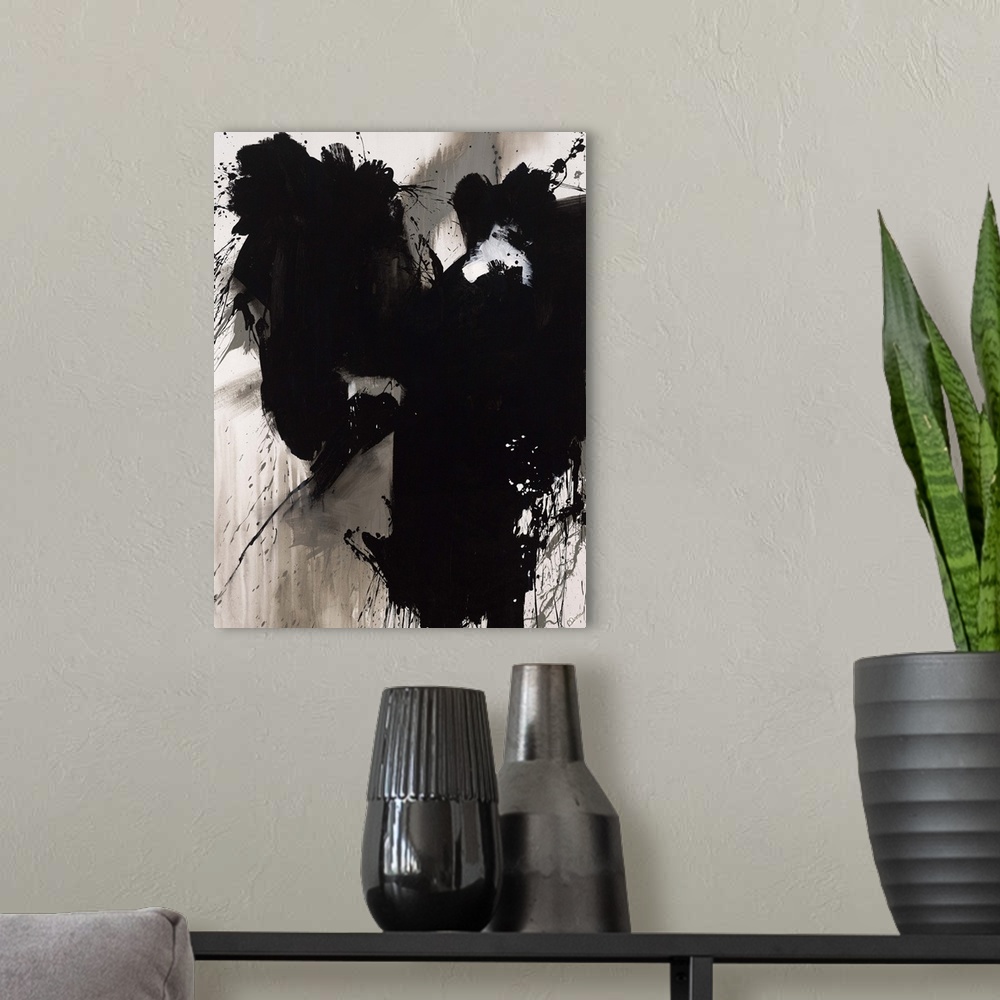 A modern room featuring Contemporary abstract painting of a giant black splash of paint smeared and splattered against a ...