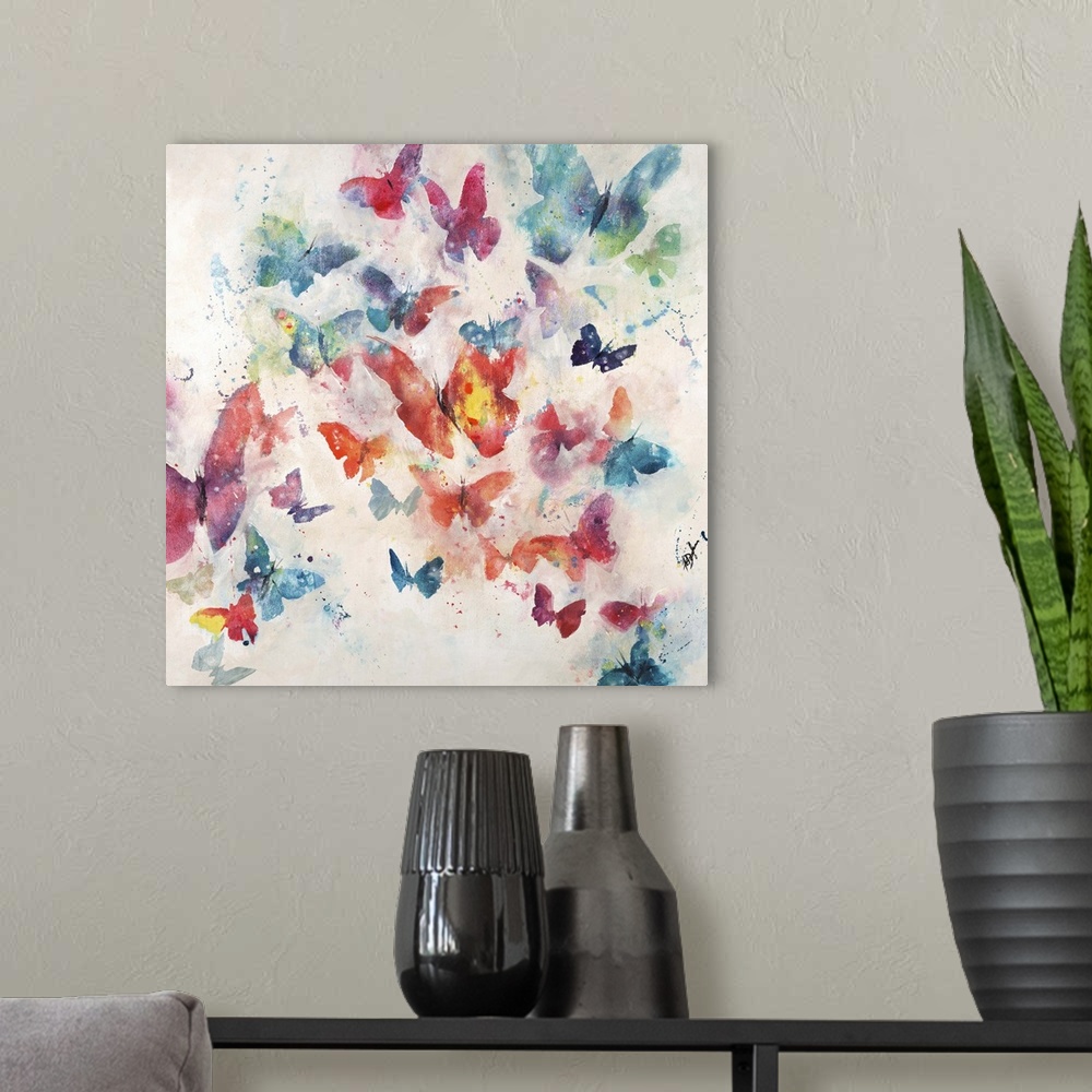 A modern room featuring Contemporary painting of a cluster of butterflies in various sizes and colors, on a light neutral...