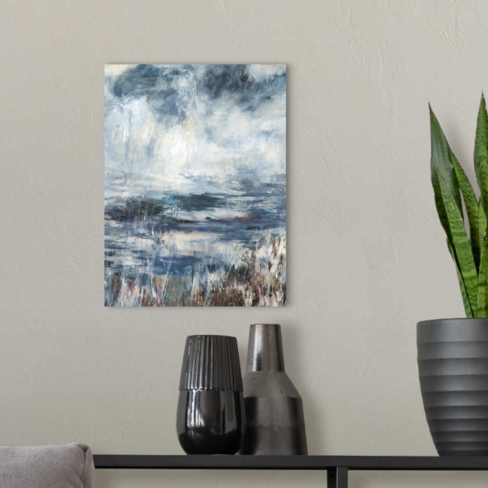 A modern room featuring Contemporary abstract painting of a  cool toned pond landscape.