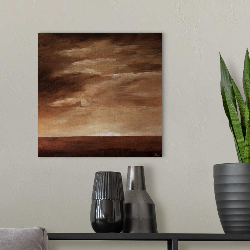 A modern room featuring Contemporary landscape painting in brown tones with a cloudy sky.