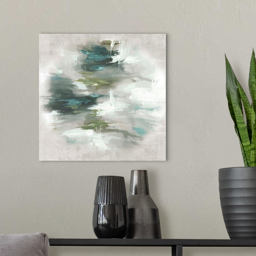 A modern room featuring Abstract artwork with different shades of green in the center that fades to a light gray.