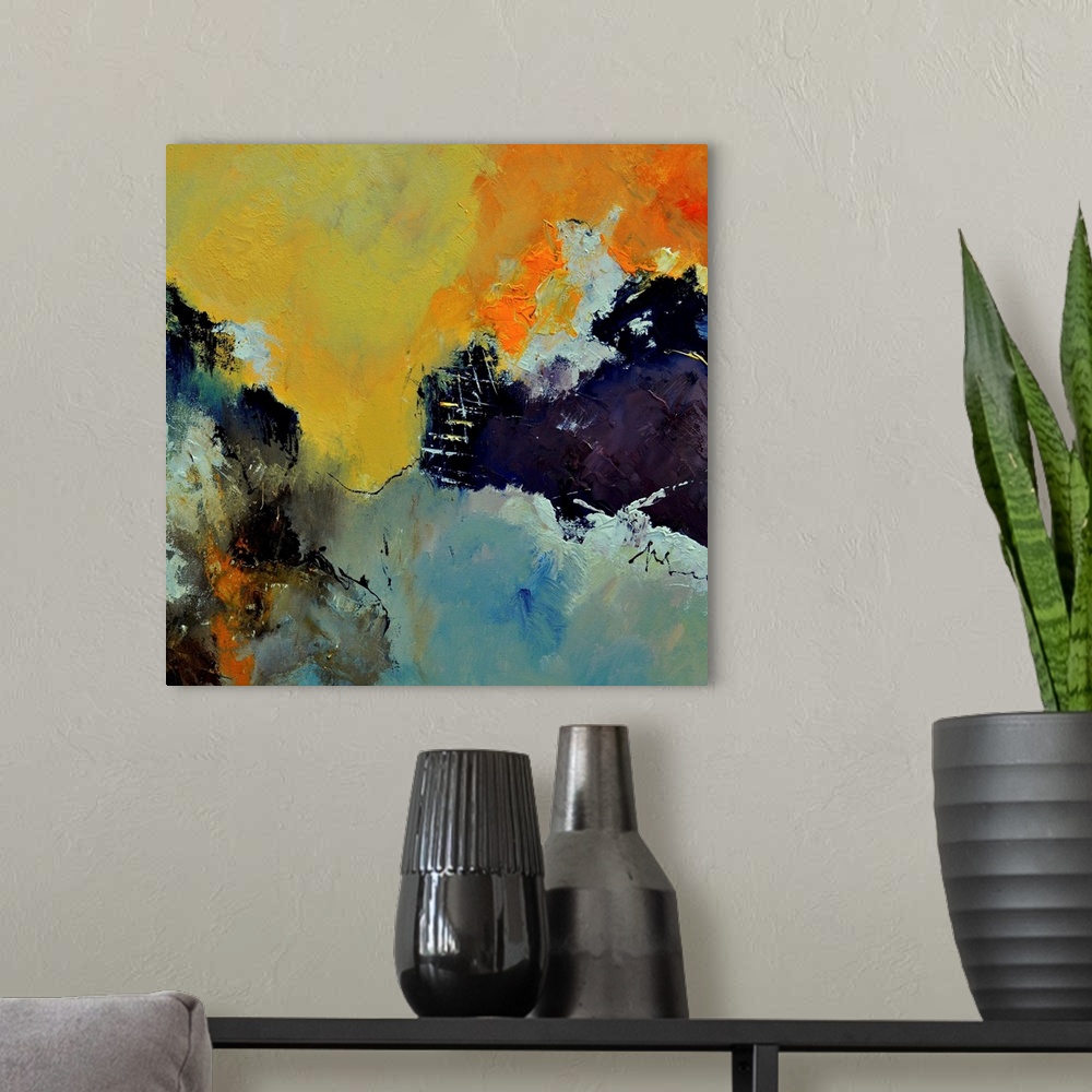 A modern room featuring Abstract painting in shades of yellow, blue, gray and orange mixed in with black contrasting desi...