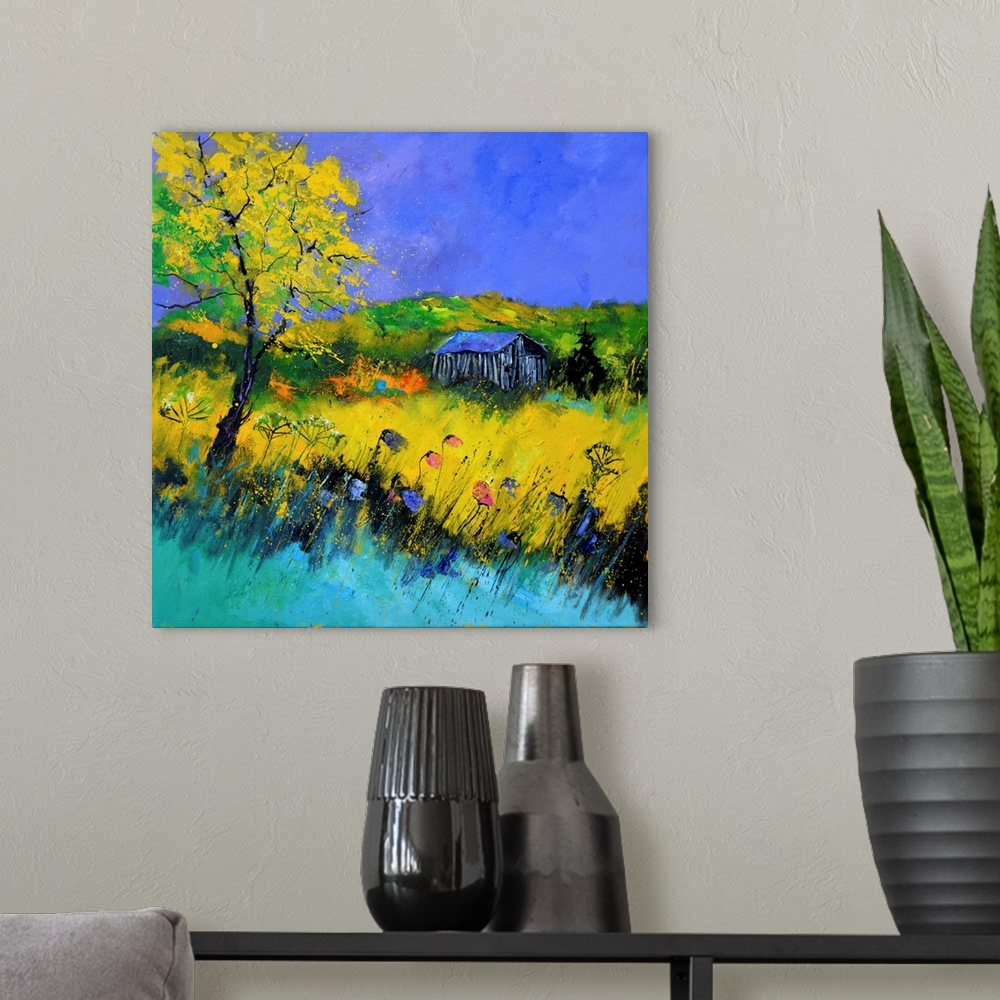 A modern room featuring Abstract landscape painting in vibrant hues.