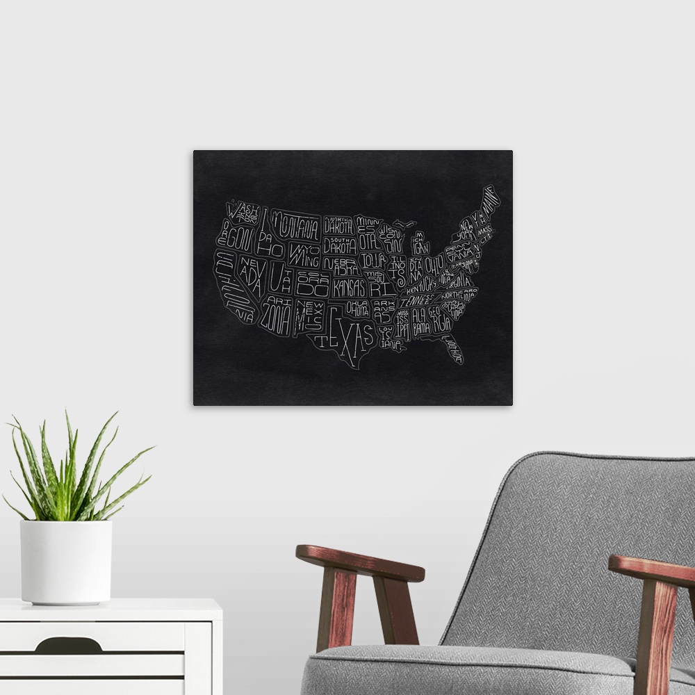 A modern room featuring Continental map of the United States with the names of the states in a handwritten style.