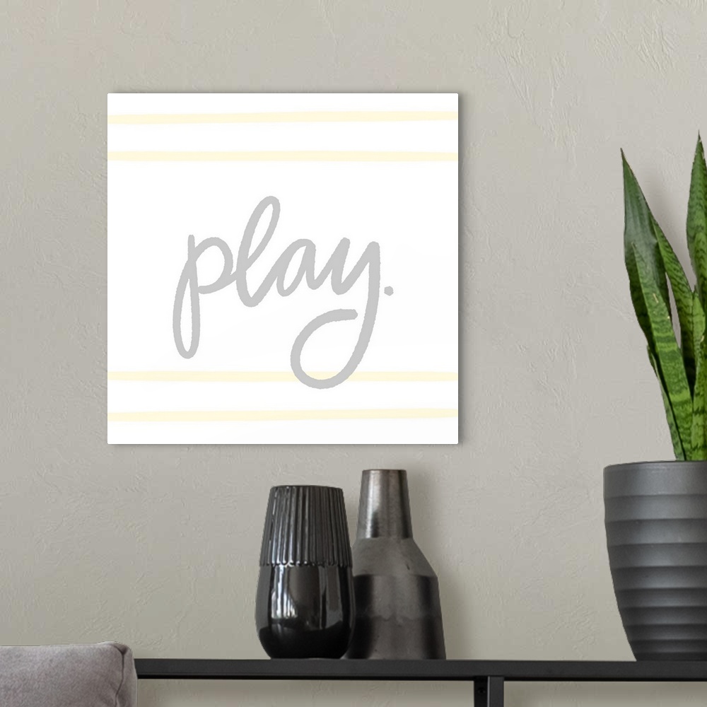 A modern room featuring "Play" in gray with light yellow horizontal lines on a white background.