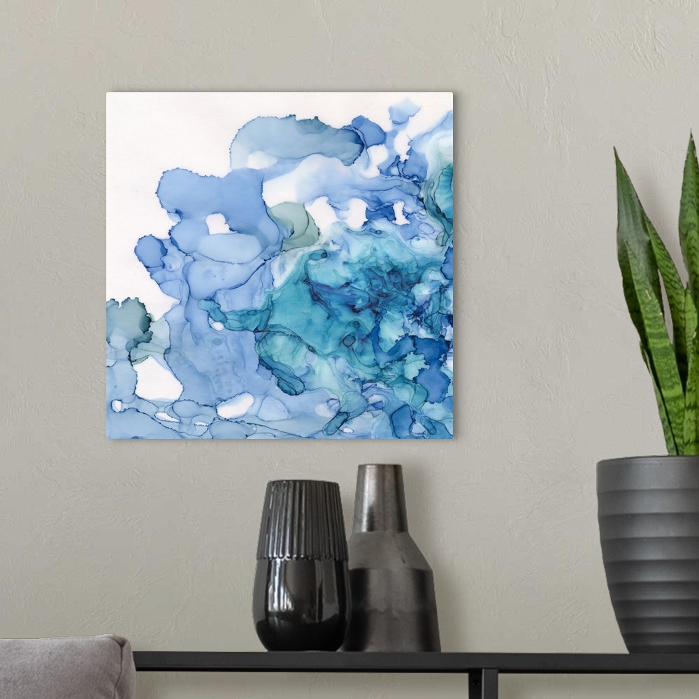 A modern room featuring Abstract watercolor painting of swirls in shades of blue.