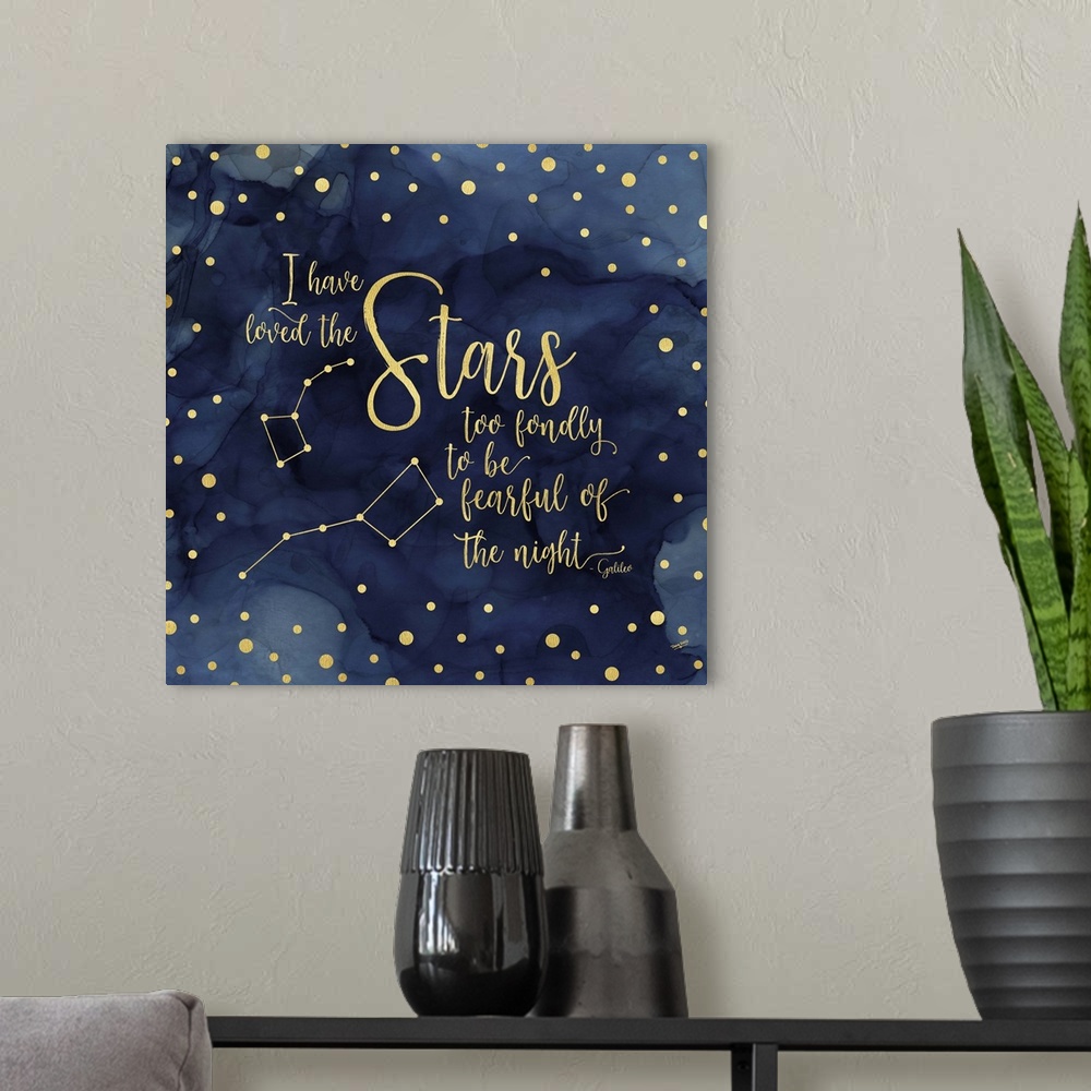 A modern room featuring "I have loved the Stars too fondly to be fearful of the night - Galileo" on a blue water-colored ...