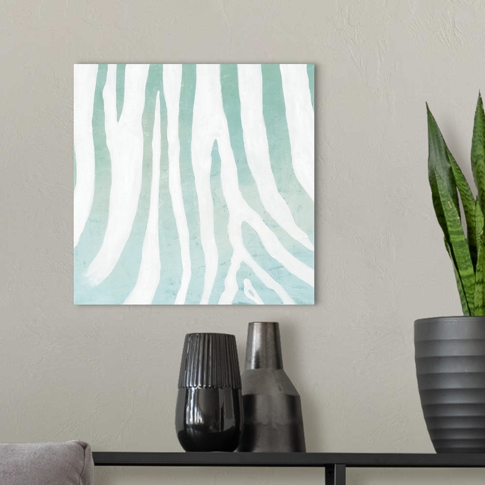 A modern room featuring A modern decorative image of a zebra pattern in subdue blues and white.