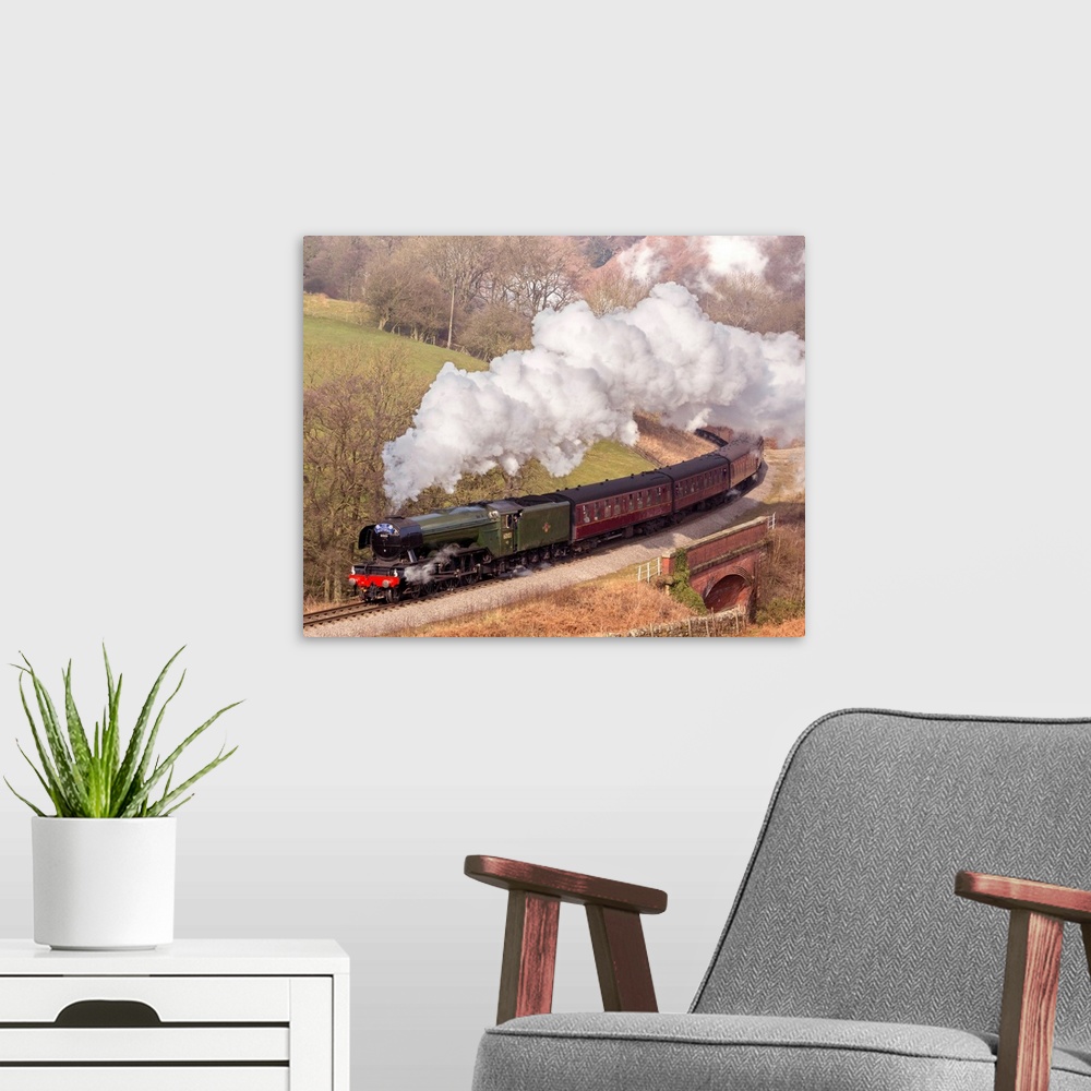 A modern room featuring The Flying Scotsman steam locomotive arriving at Goathland station on the North Yorkshire Moors R...
