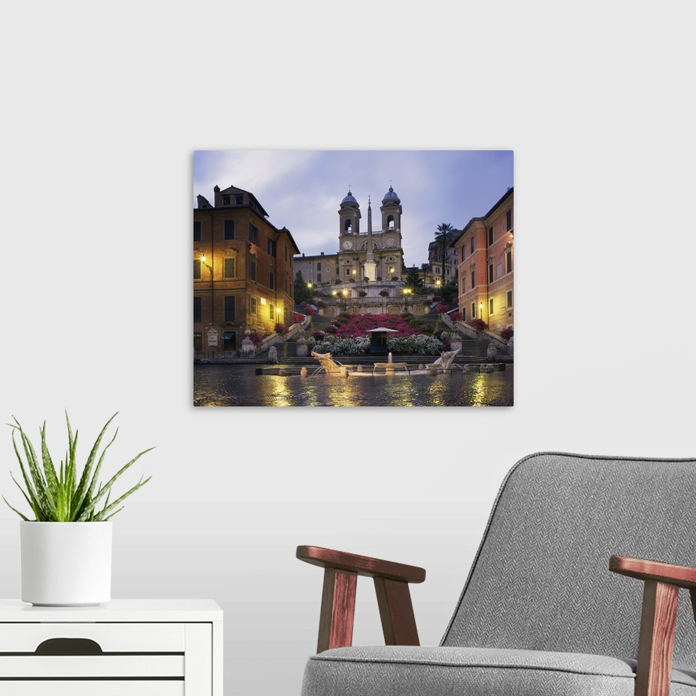 A modern room featuring The Spanish Steps illuminated in the evening, Rome, Lazio, Italy