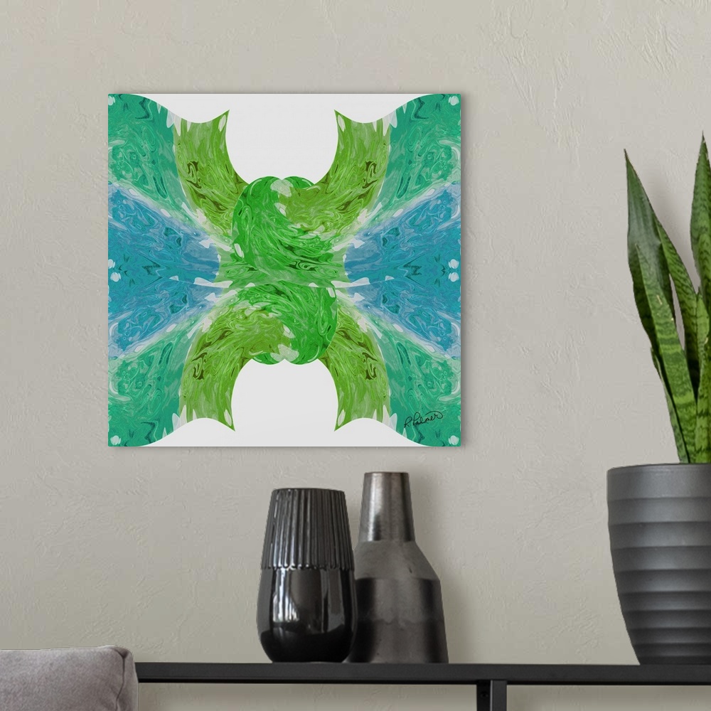 A modern room featuring A square design of blue and green colors in the shape of a knot on a white backdrop.