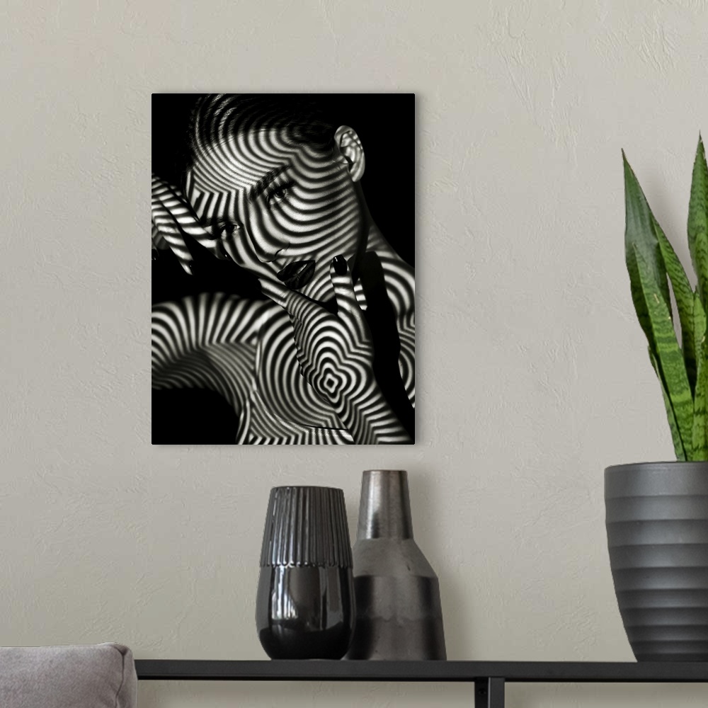 A modern room featuring Black And White Portrait Of A Girl With A Striped Shadow Pattern On The Face And Body