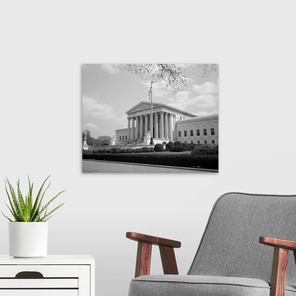 A modern room featuring American history photo showing the facade of the United States Supreme Court.