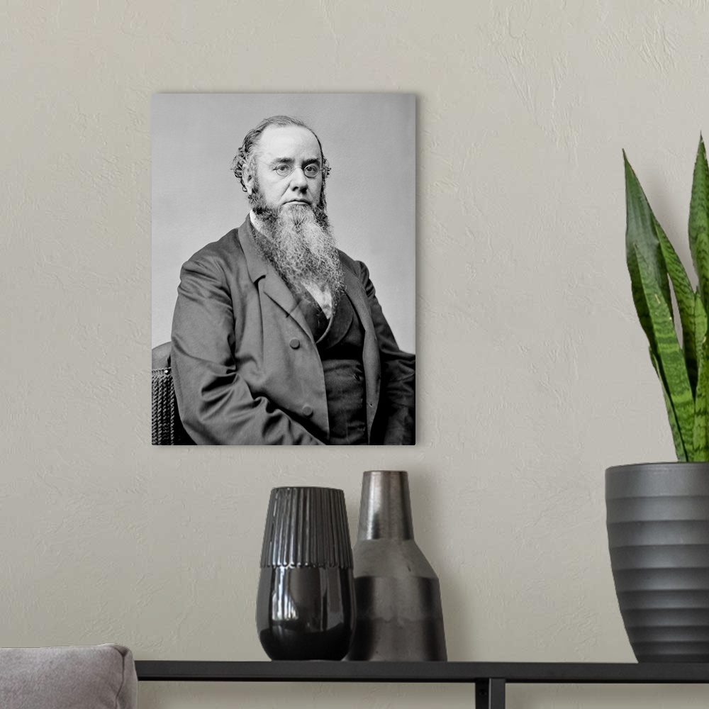 A modern room featuring American history photograph of Hon. Edwin Stanton dated between 1855 to 1865.