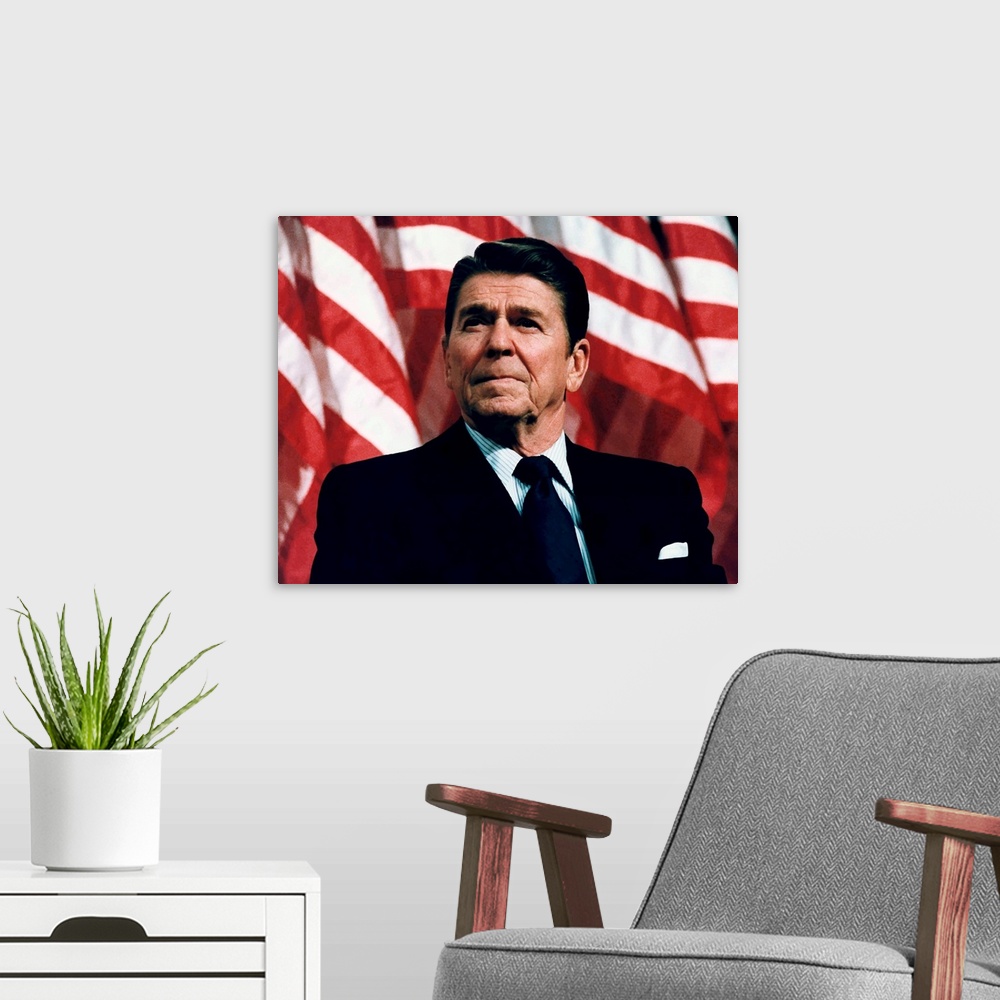 A modern room featuring Digitally restored vector photo of President Ronald Reagan speaking in front of American Flags.