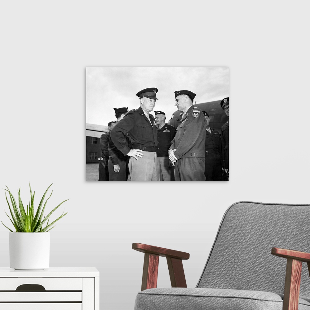 A modern room featuring General Dwight Eisenhower talking with General Lucius Clay at Gatow Airport in Berlin, Germany, 1...