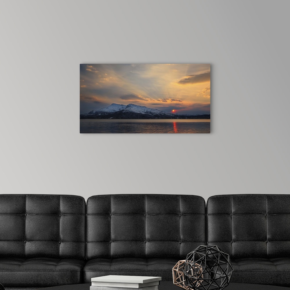 A modern room featuring Midnight Sun over Tjeldsundet and the Saetertinden Mountain in Troms County, Norway.