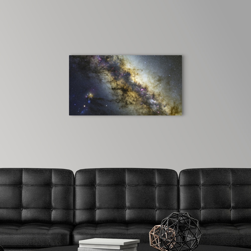 A modern room featuring Milky Way with visible planets, nebulae and open clusters.