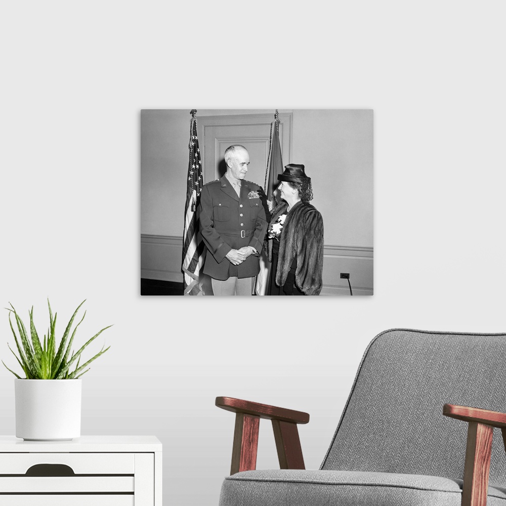 A modern room featuring General Omar Bradley and his wife after his swearing in ceremony as the Army Chief of Staff, 1948.