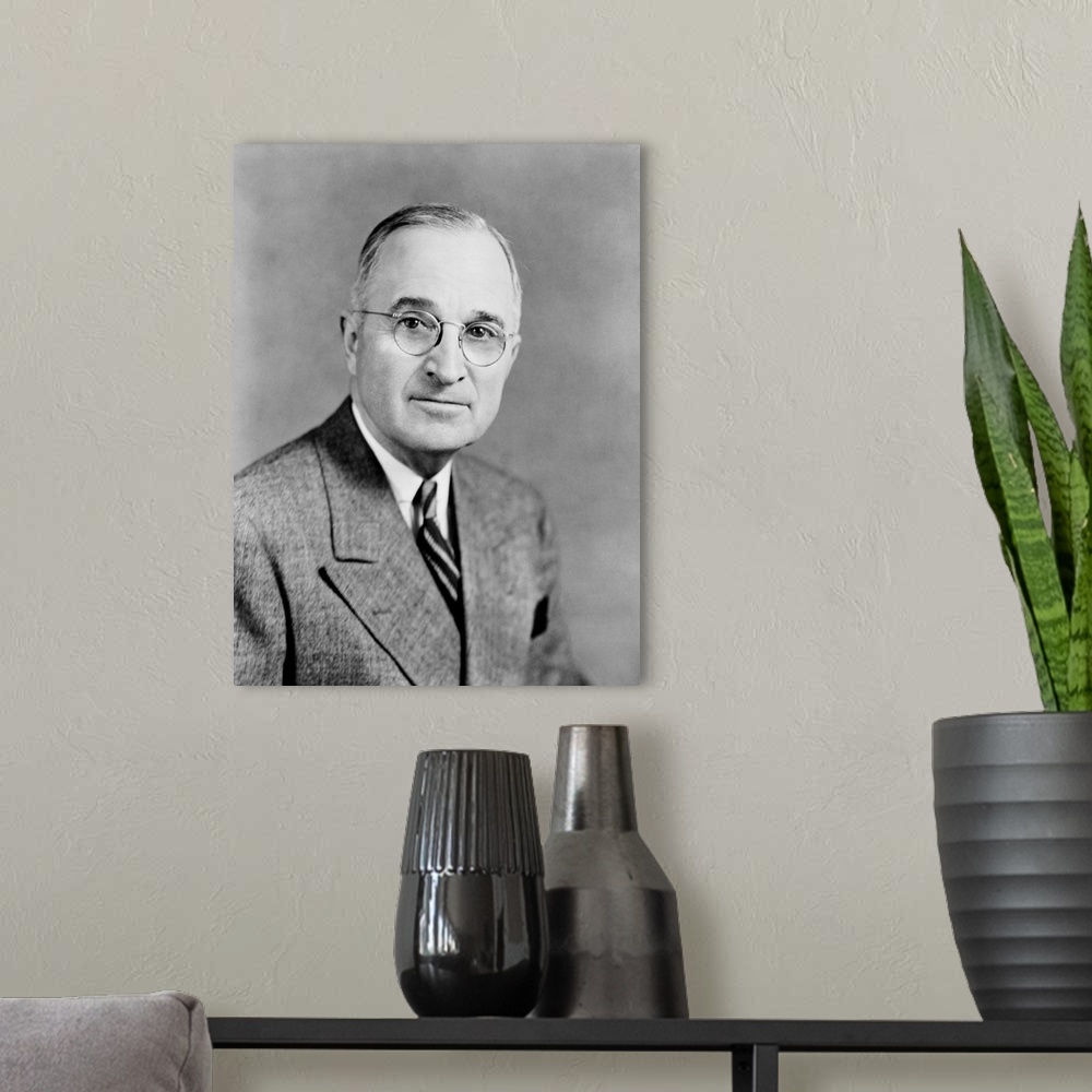 A modern room featuring Presidential history photograph of President Harry S. Truman.