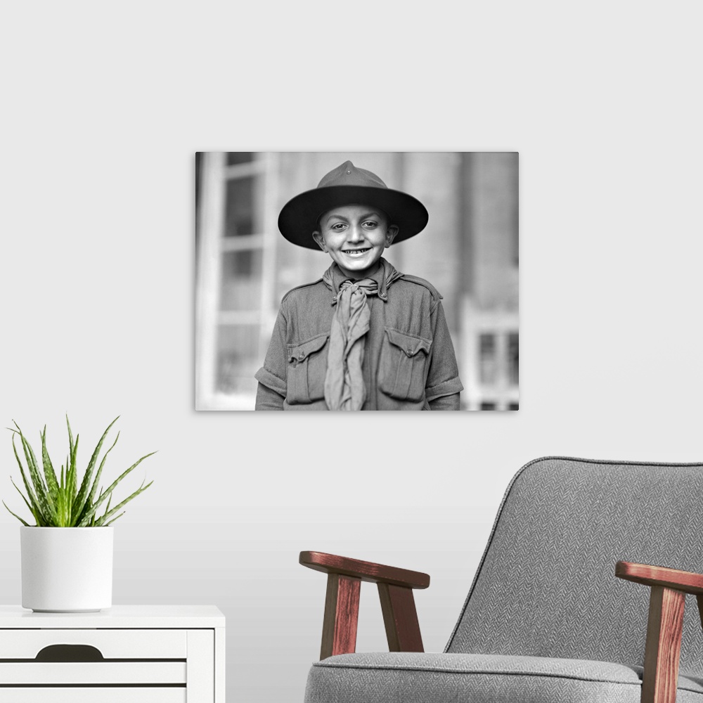 A modern room featuring World War I photo of a charter member of the American Red Cross Boy Scout Troop Paris.