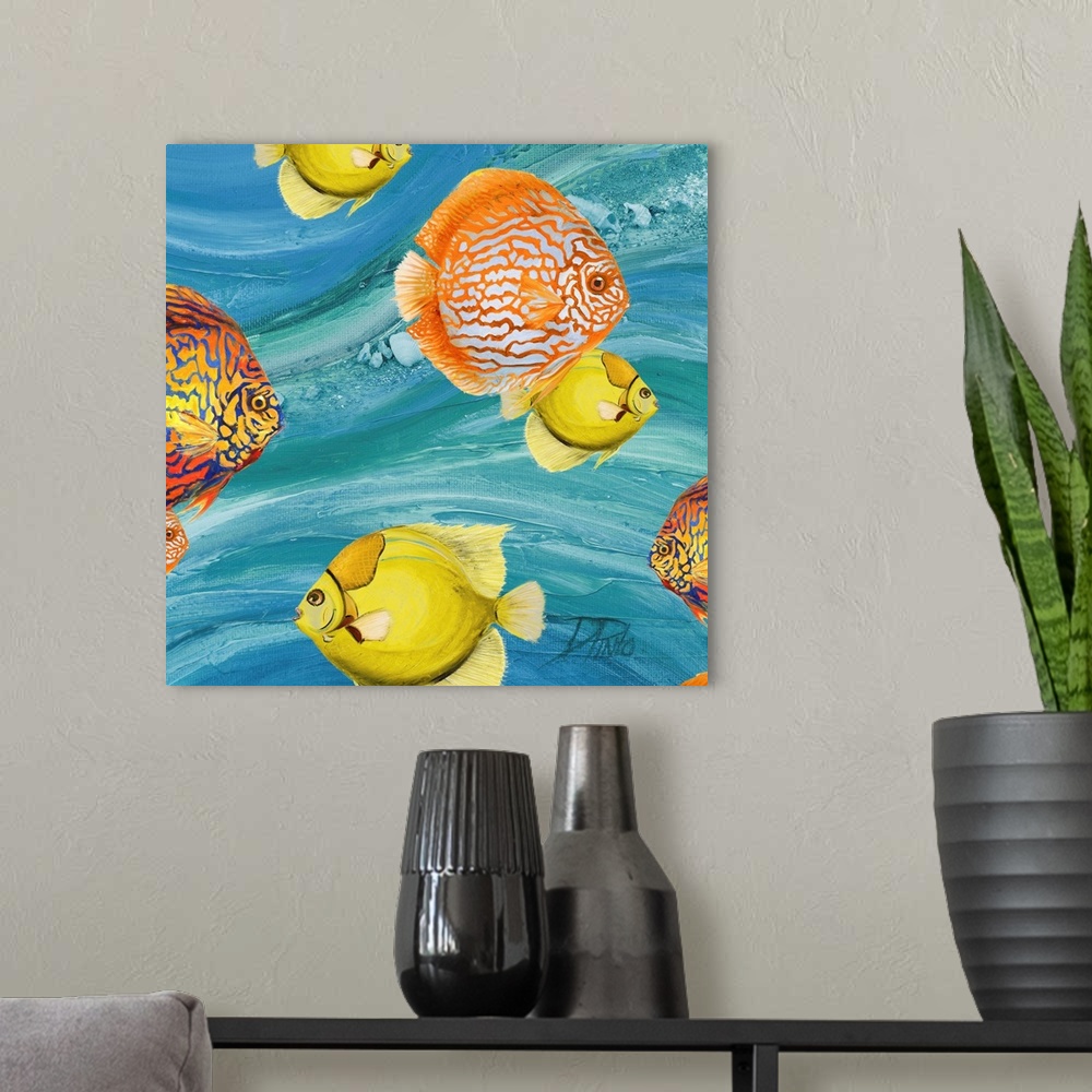 A modern room featuring Decorative artwork of a group of tropical fish in yellow and orange.