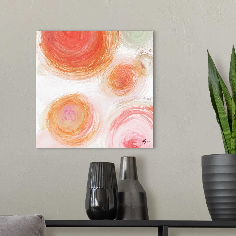 A modern room featuring Circular designs in vibrant warm colors fill this contemporary artwork.