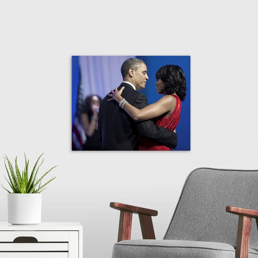 A modern room featuring BARACK OBAMA (1961- ). 44th President of the United States. Dancing with First Lady Michelle Obam...