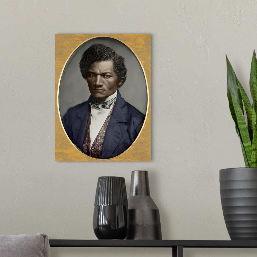 A modern room featuring FREDERICK DOUGLASS (c1817-1895). American abolitionist. Colorized daguerreotype by Samuel J. Mill...