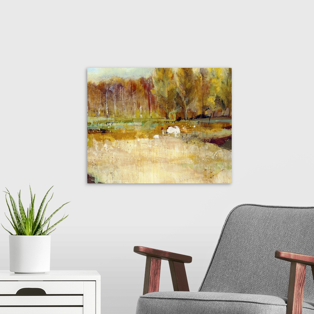 A modern room featuring Contemporary landscape painting looking at a line of trees in fall foliage.