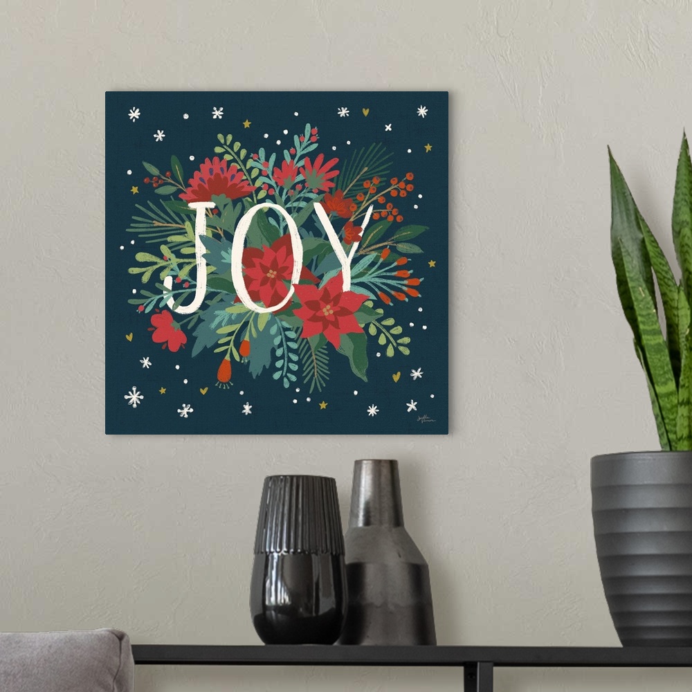 A modern room featuring Decorative artwork of red flowers and leaves with the text "Joyy" on a dark navy background.