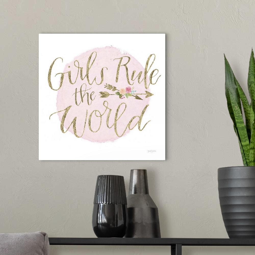 A modern room featuring 'Girls Rule the World'