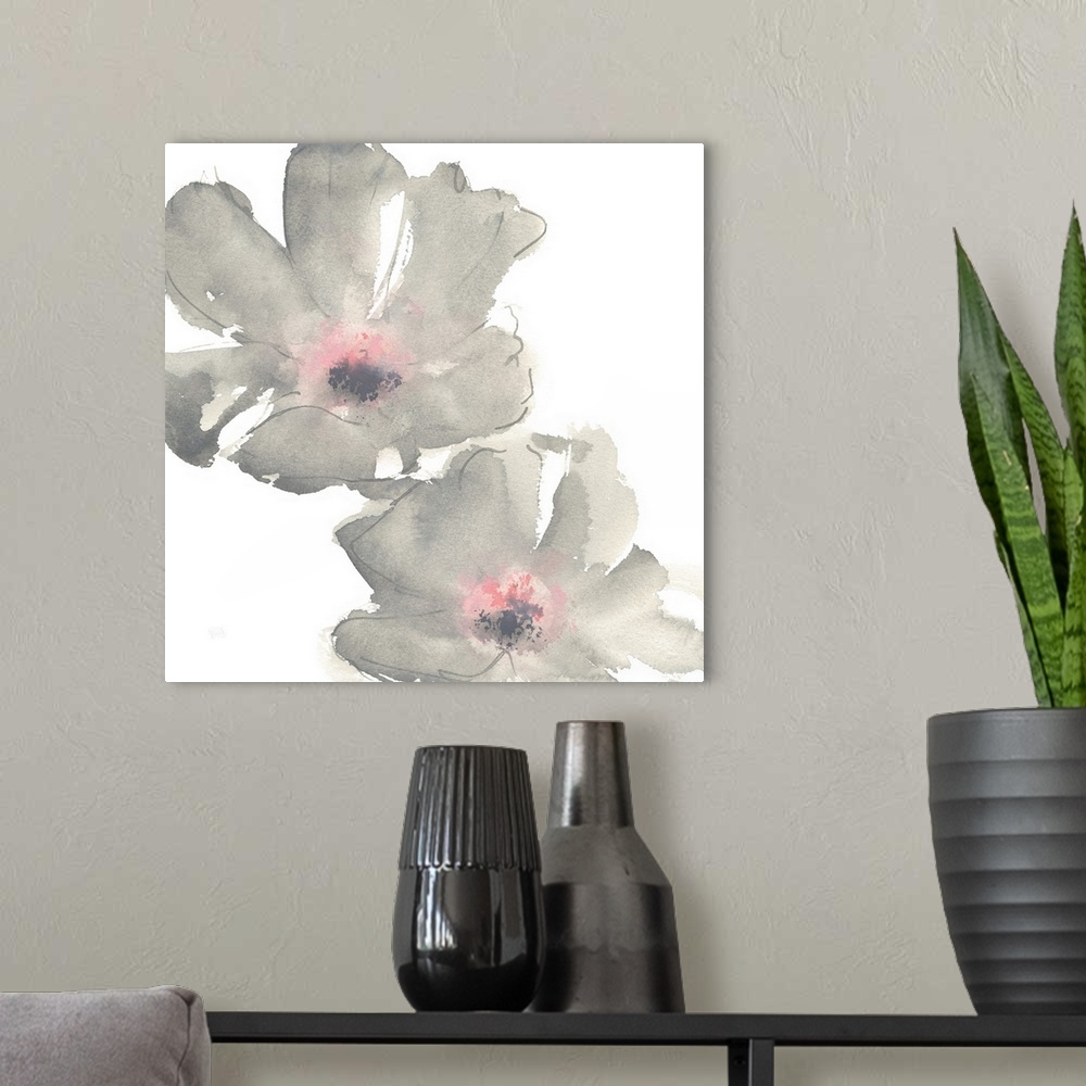 A modern room featuring Decorative artwork of delicate flowers filled with pink and gray watercolor.