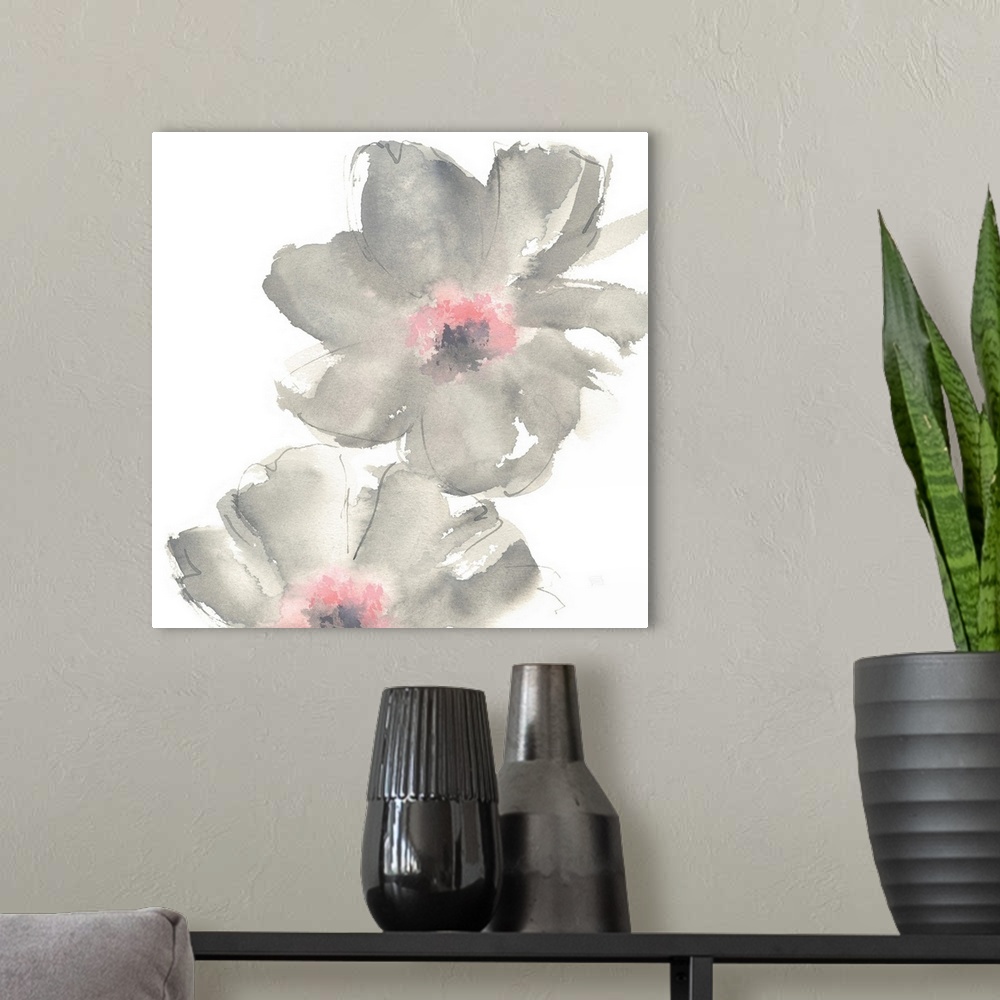 A modern room featuring Decorative artwork of delicate flowers filled with pink and gray watercolor.