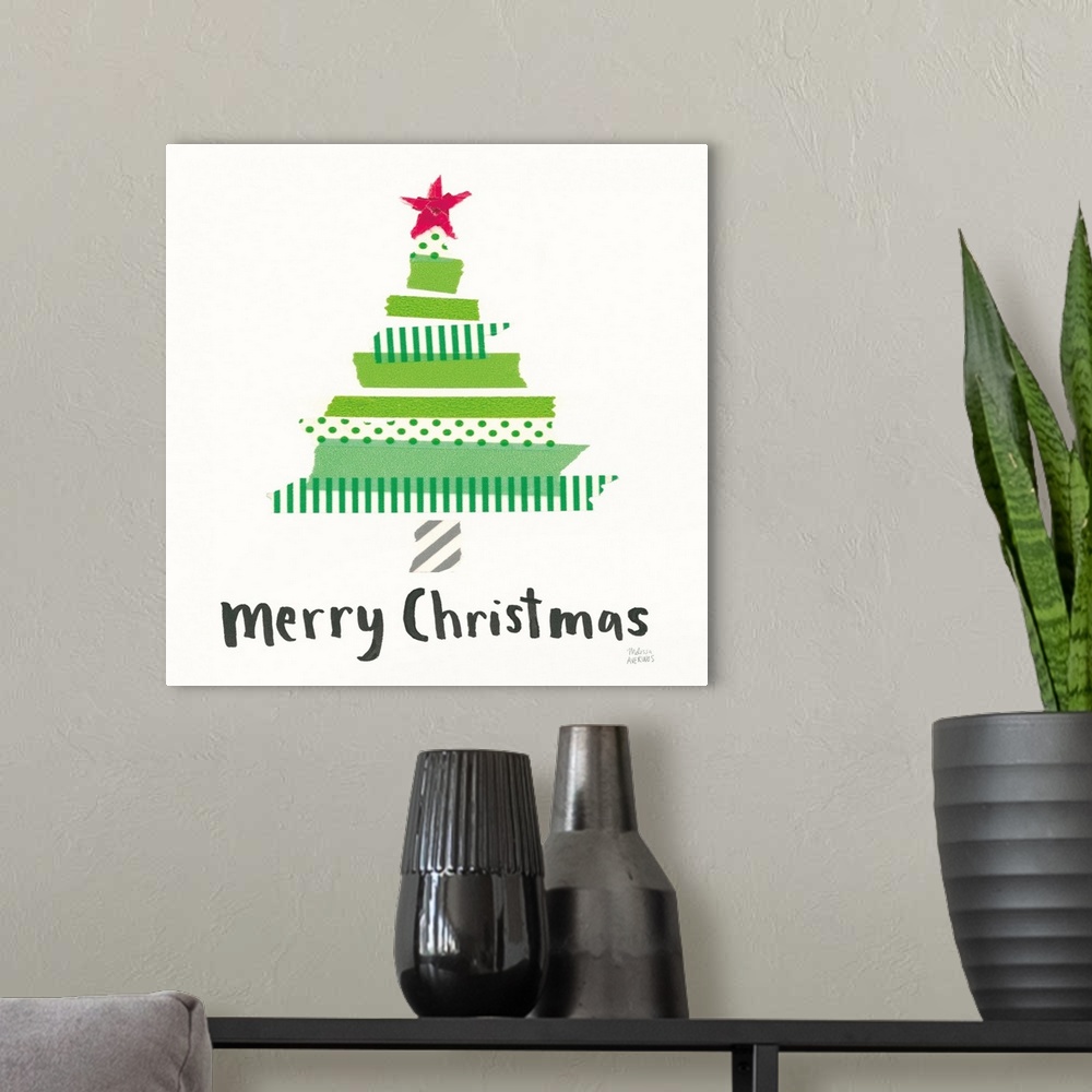 A modern room featuring Mixed media art with a Christmas tree and 'Merry Christmas' written in black below on a white squ...