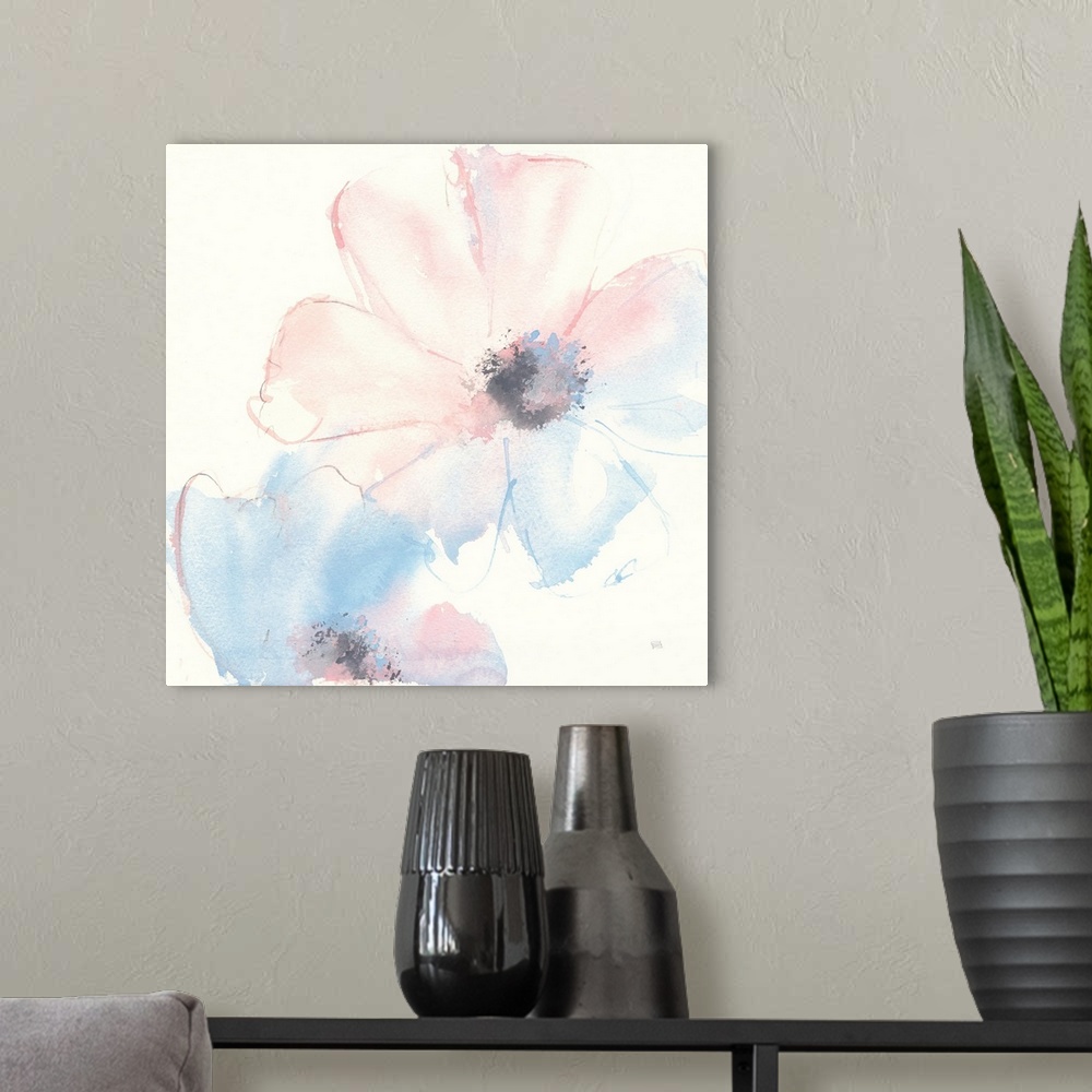 A modern room featuring Decorative artwork of delicate flowers filled with a watercolor gradient of pink and blue.