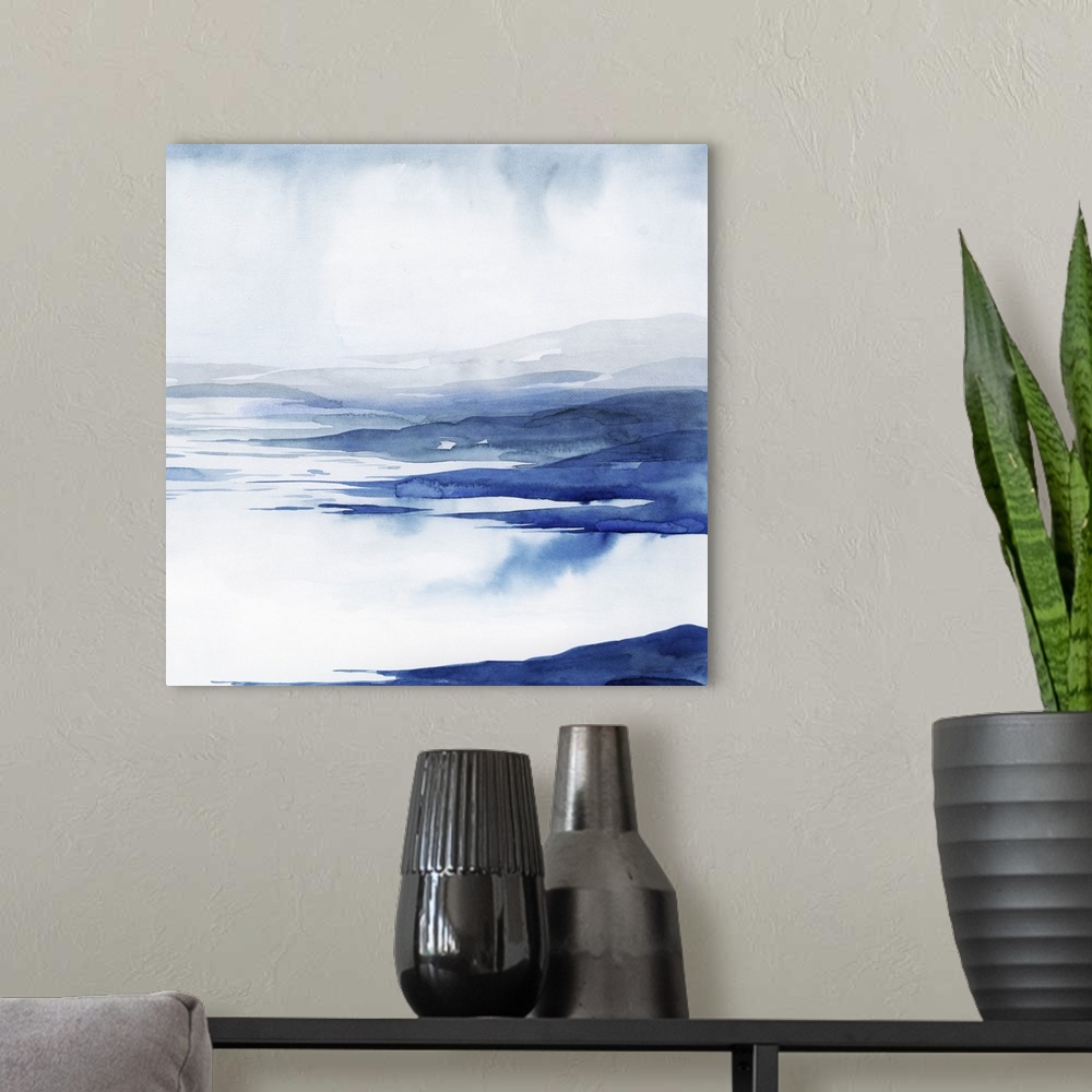 A modern room featuring Blue and white abstract artwork resembling rushing glacial water.