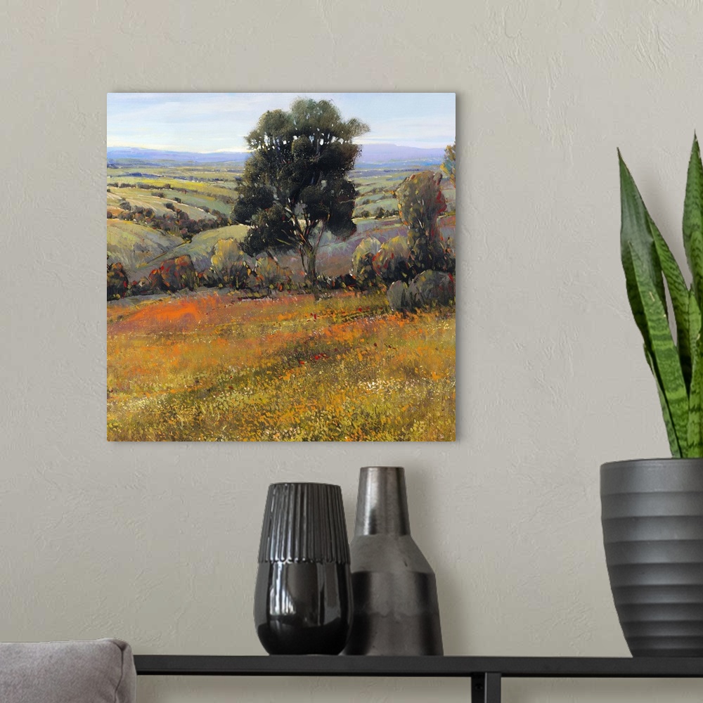 A modern room featuring Contemporary landscape painting of a serene countryside landscape in summer with golden field rea...