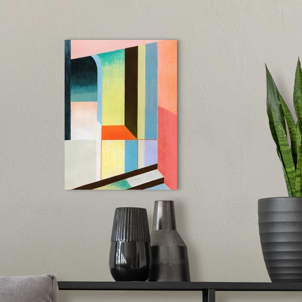 A modern room featuring A brightly colored geometric abstract piece featuring an archway and block shapes that appear to ...