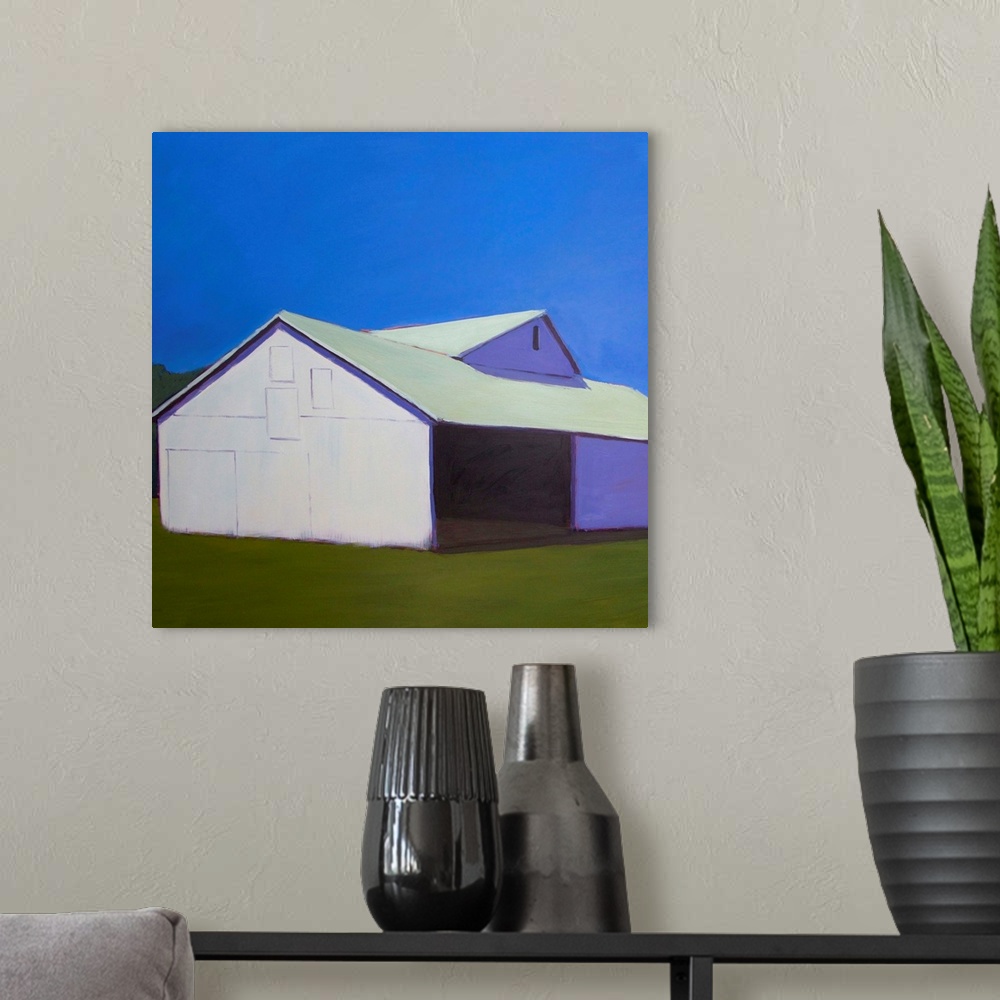 A modern room featuring Contemporary painting of a white barn in a rural field in afternoon light.