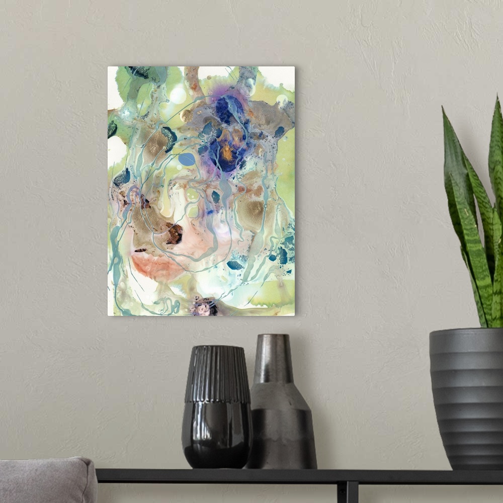 A modern room featuring Vertical abstract artwork of varies colors in a messy swirls with fine drips of paint.