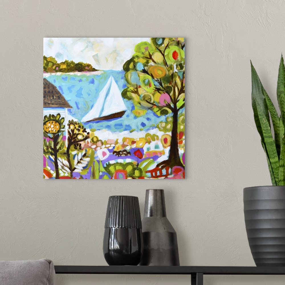 A modern room featuring Contemporary artwork of a sailboat on the ocean, with a tree in the foreground.