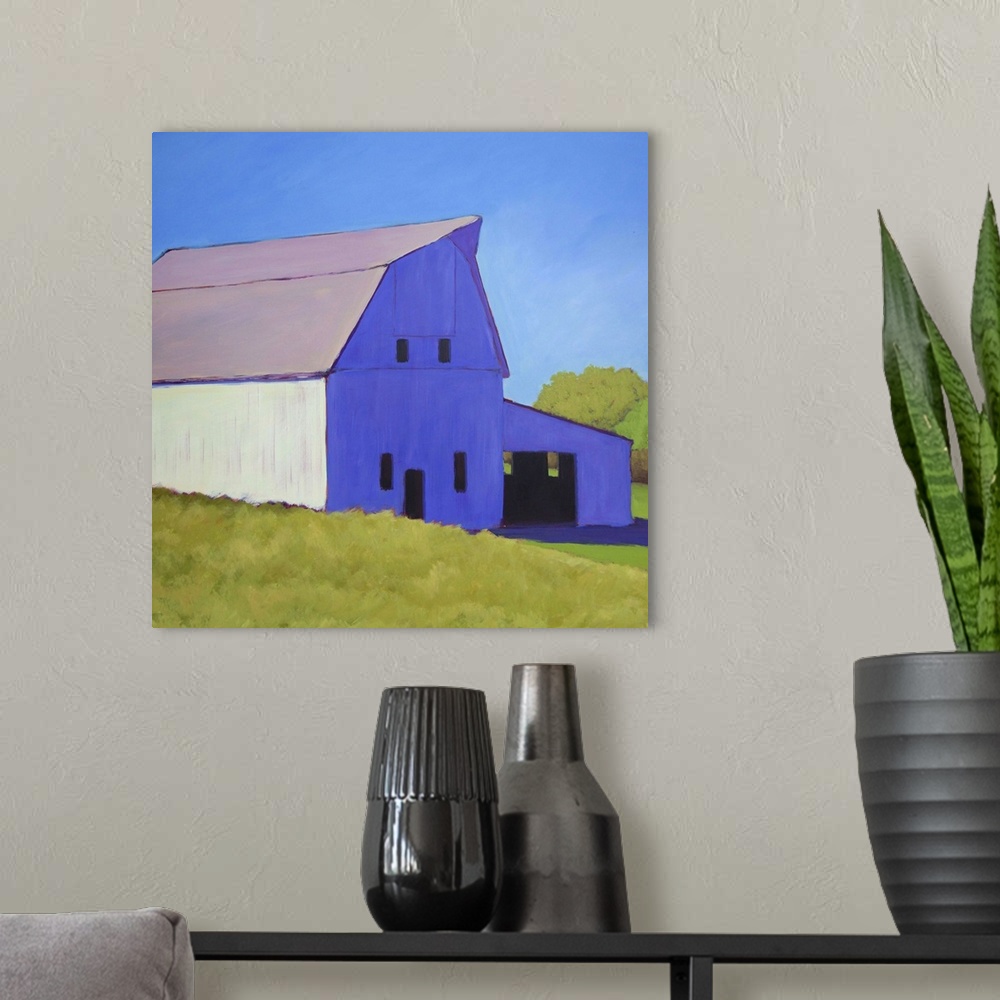 A modern room featuring Contemporary painting of a white barn in a rural field in afternoon light.
