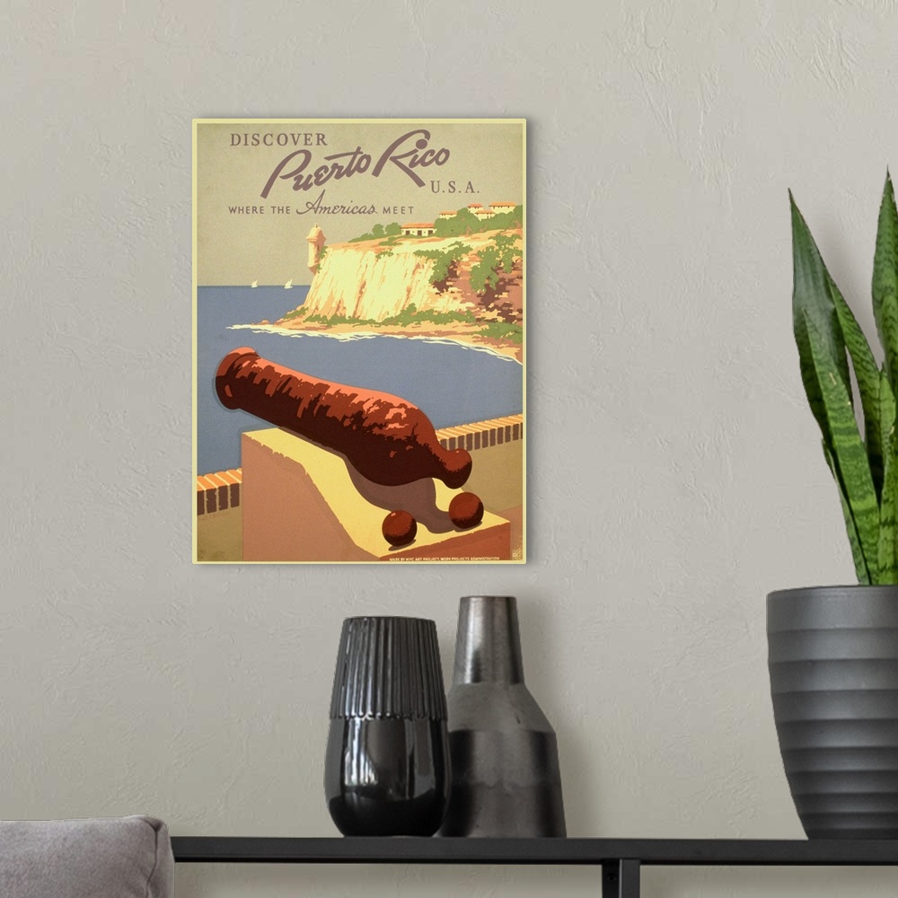 A modern room featuring Vintage travel poster advertising Puerto Rico, with a cannon overlooking the ocean.
