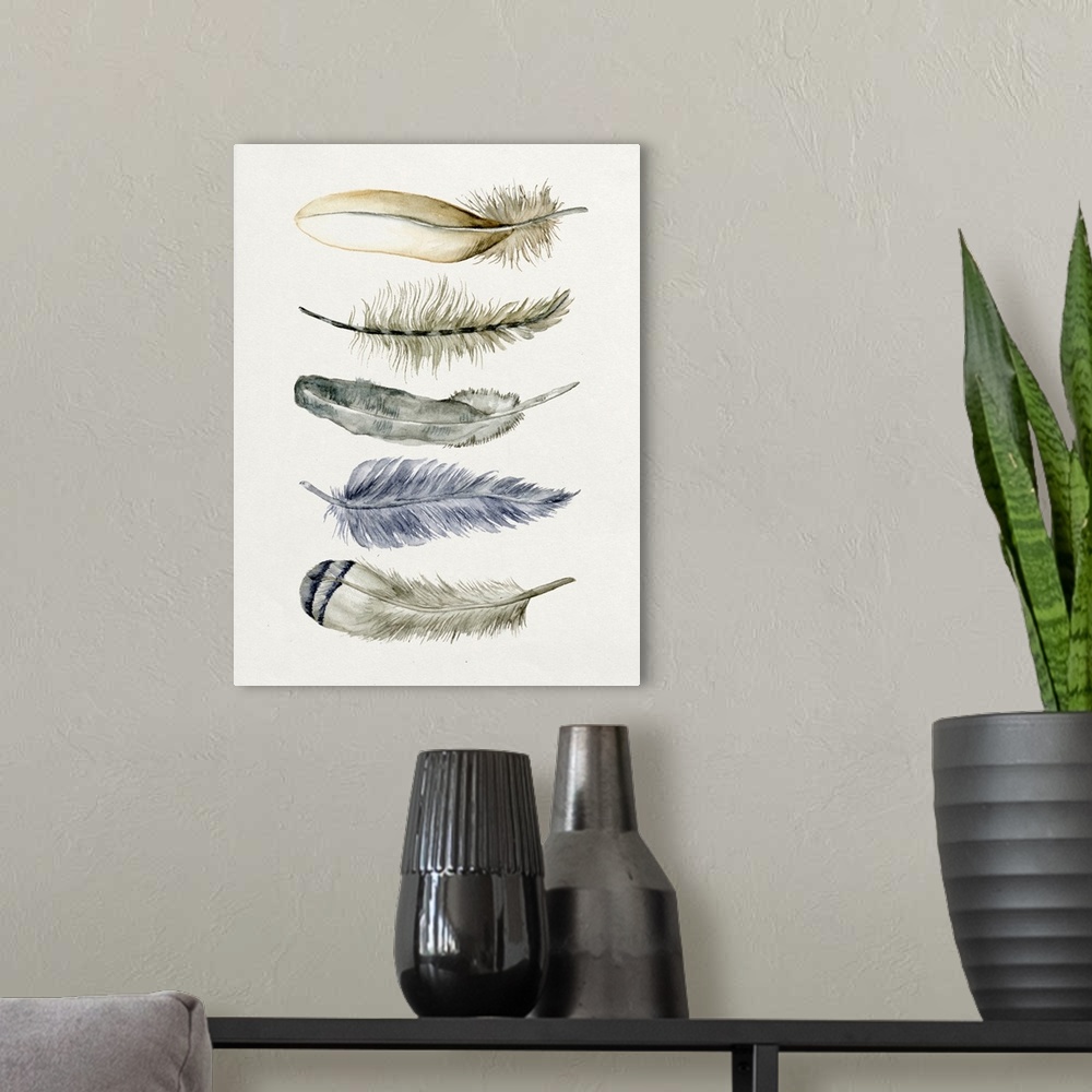 A modern room featuring Watercolor art print of five patterned feathers on beige.
