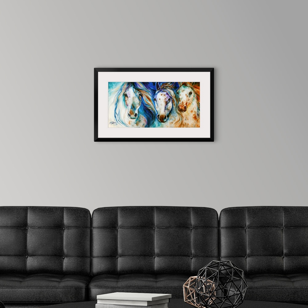 A modern room featuring Panoramic painting of three Appaloosa horses with playful hues and beautifully flowing manes.
