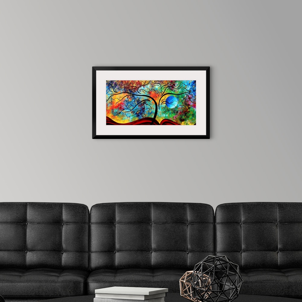 A modern room featuring Panoramic contemporary art portrays a bare tree as it sits on a rolling hill in front of a backgr...